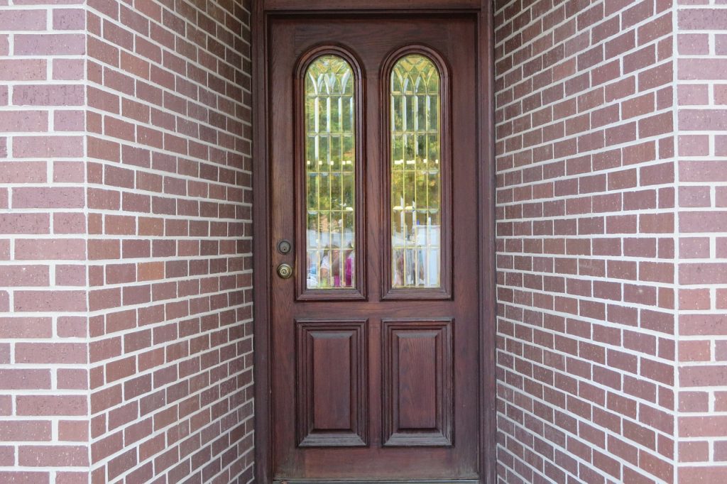 A stained wood front door