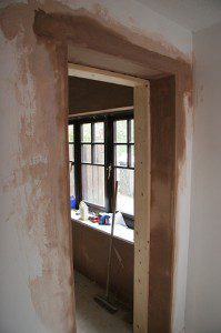 Plastering around a new door lining