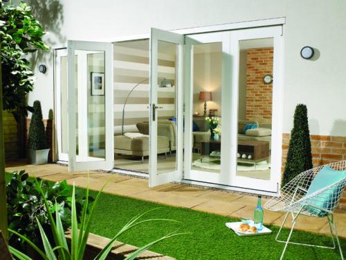 https://www.vibrantdoors.co.uk/news/wp-content/uploads/2014/01/patio-doors-externally.jpg