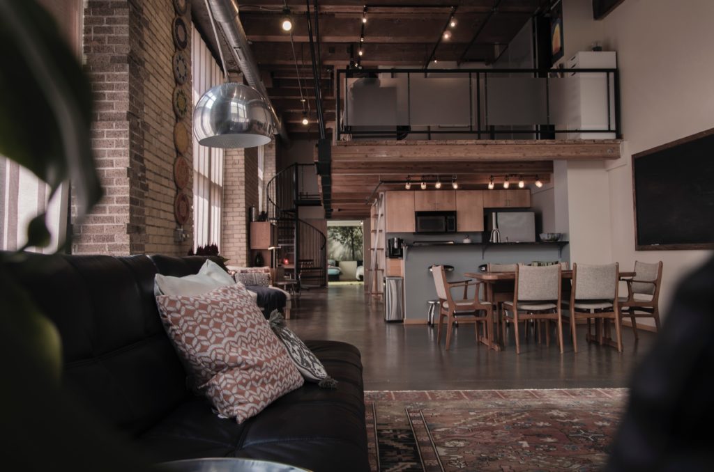 Photograph of a loft-style apartment with open plan layout