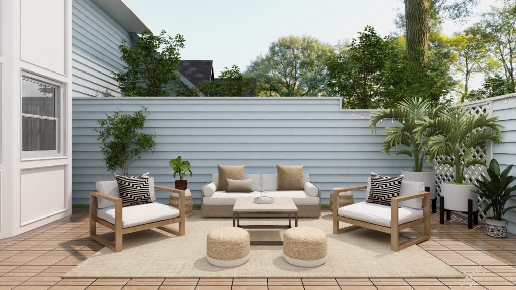 Photo of a patio area with seating, table and plants