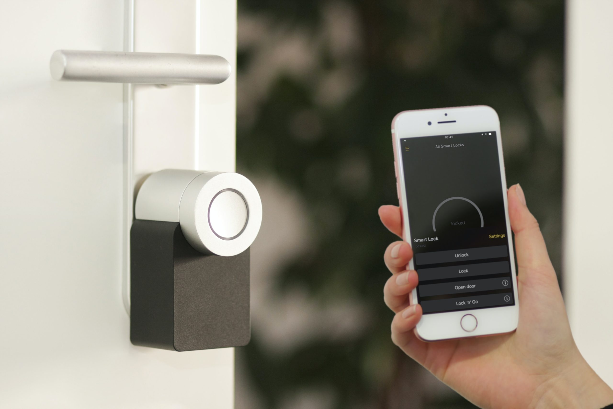 Photograph of a smart lock being operated via a mobile device
